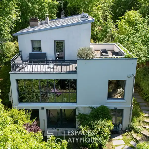 ELEGANT GLASS-ROOFED HOUSE WITH GARDEN VIEWS