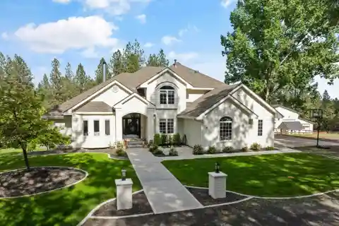 Exceptional Home on Five Wooded Acres