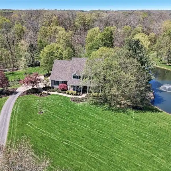 IMPECCABLE HOME ON FIVE-PLUS ACRES