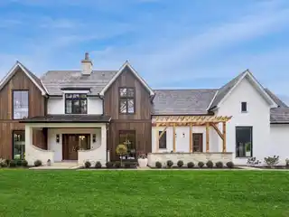 Belgian-Inspired Masterpiece with Cathedral Ceilings