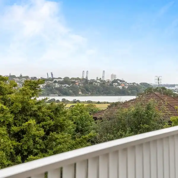 STYLISH THREE-LEVEL HOME WITH PRIVATE DECK