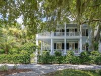 MAGNIFICENT WATERFRONT HOME IN DESIRABLE CORNER LOCATION