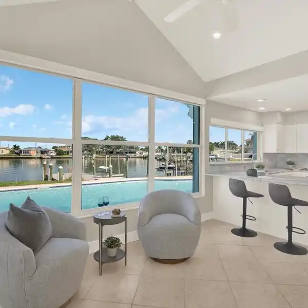 PINNACLE OF WATERFRONT LIVING FROM THIS BEAUTIFULLY REMODELED HOME