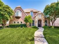 BEAUTIFUL BRICK HOME IN LAKES ON LEGACY