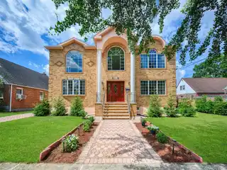 Grand Brick Home with Elegant Modern Updates