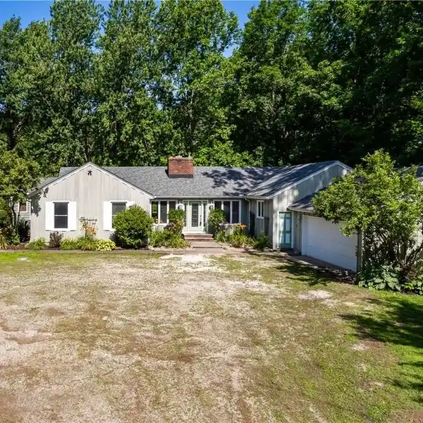 BEAUTIFULLY MAINTAINED RANCH HOME ON OVER EIGHT ACRES