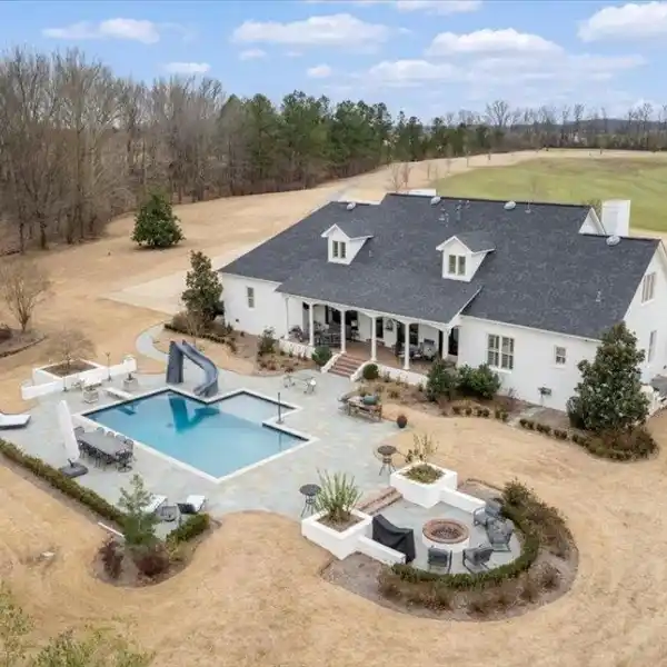 EXPANSIVE PROPERTY ON ACRES OF SERENE PRIVATE LAND