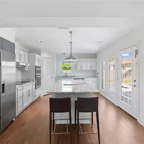 ELEVATED COASTAL COTTAGE WITH RESORT-STYLE POOL