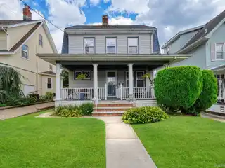 Charming Dutch Colonial Revival Home