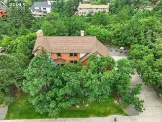 Broadmoor Bluffs Home with Mountain and City Views