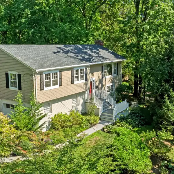 LIGHT-FILLED HOME WITH AN AMAZING OUTDOOR SETTING