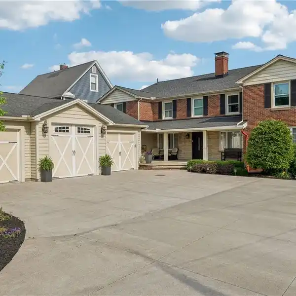 ELEGANT BRICK COLONIAL WITH PRIVATE BEACH ACCESS