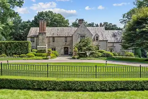 Meticulously Renovated Stone Tudor Home