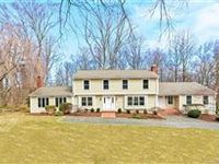 EXCEPTIONAL CLASSIC COLONIAL ON OVER AN ACRE