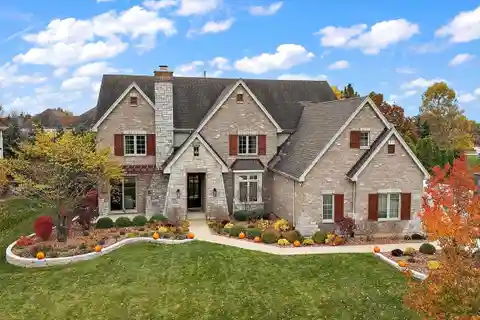 Impressive Brick Home with Luxe Indoor-Outdoor Living