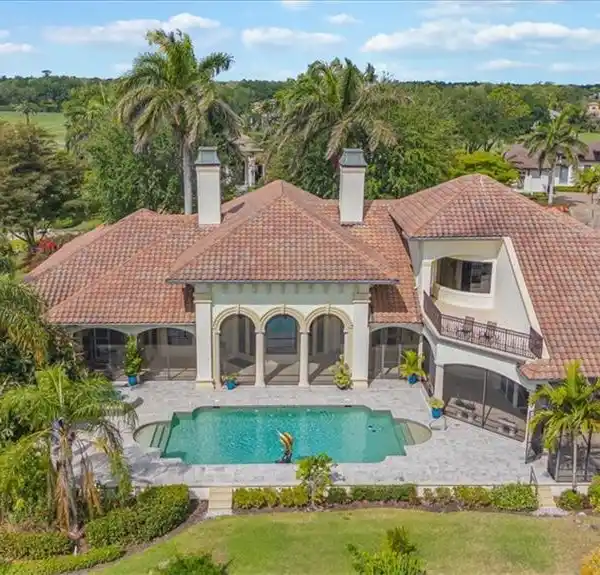 CUSTOM ESTATE ON A PRIME GOLF LAKEFRONT LOT