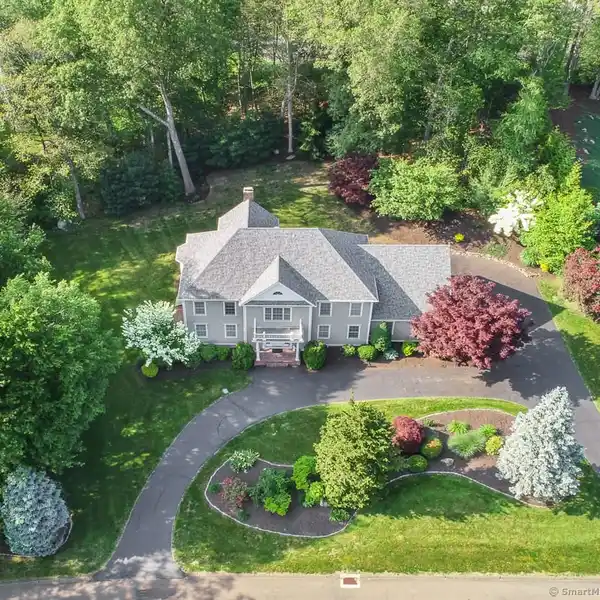 EXCEPTIONAL CUSTOM COLONIAL ON A PRESTIGIOUS STREET