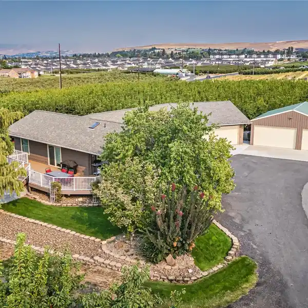 SECLUDED EAST WENATCHEE RAMBLER ON 4.5 ACRES OF CHERRY ORCHARDS