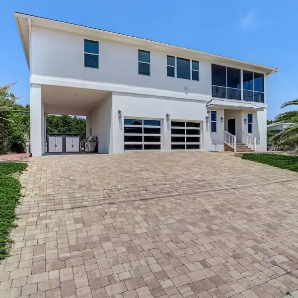 LOW-MAINTENANCE FURNISHED HOME STEPS TO THE BEACH
