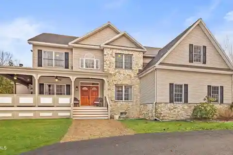 Exquisite Home on over Six Peaceful Acres