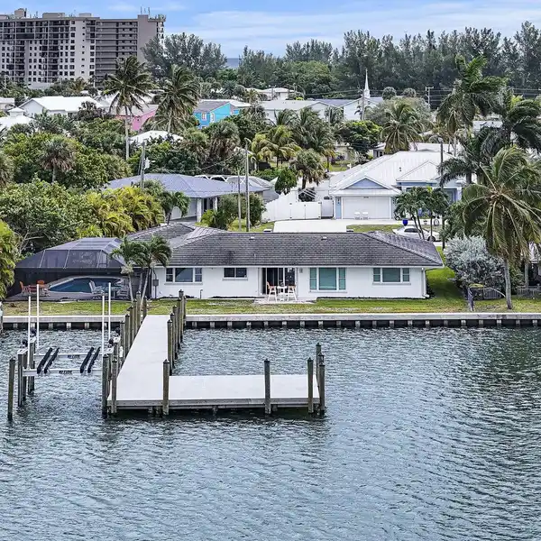 RENOVATED WATERFRONT HOME WITH PRIVATE DOCK AND LIFT