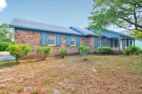 A Rare Intracoastal Offering — Iconic Oak Island Estate on Two Expansive Waterfront Lots