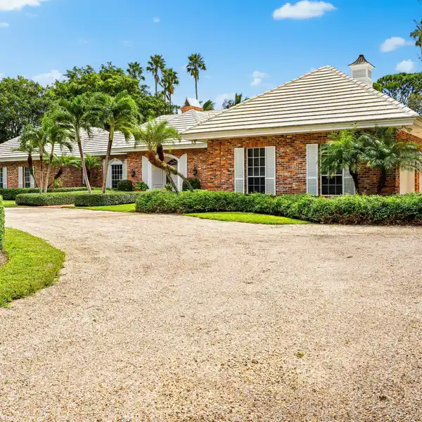 ELEGANT BRICK RANCH-STYLE ESTATE