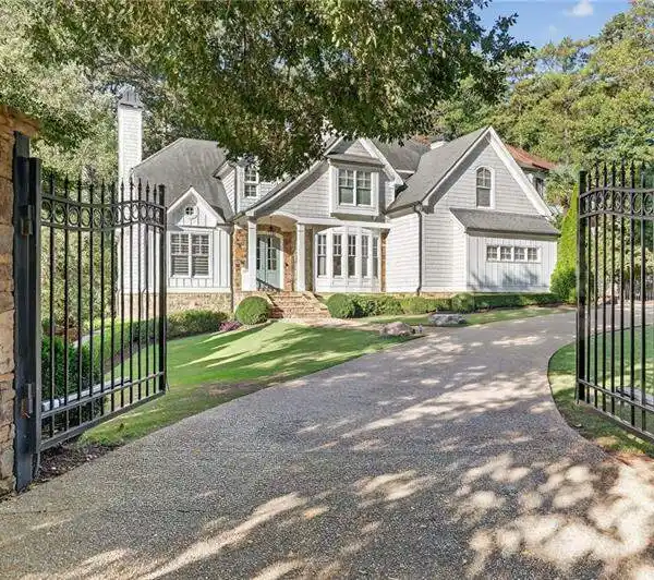 BEAUTIFUL HOME IN A PRIVATE SETTING WITH RESORT-STYLE POOL
