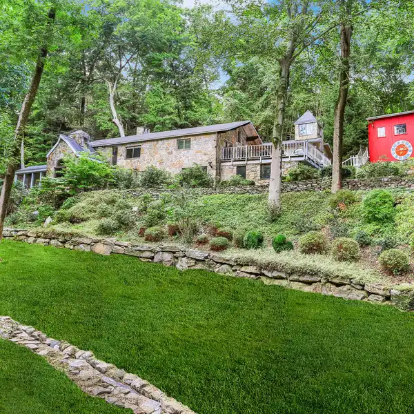 EXCEPTIONAL STONE HOME WITH HEATED BARN