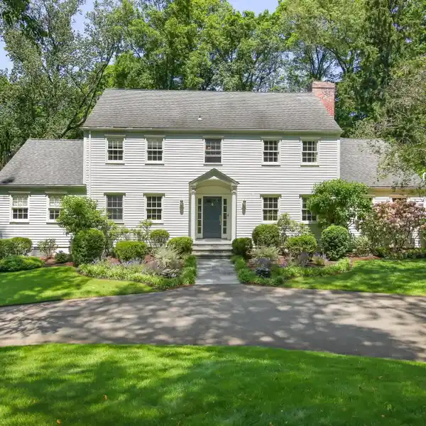 GRACIOUS CENTER HALL COLONIAL IN A DESIRABLE WEST SIDE NEIGHBORHOOD