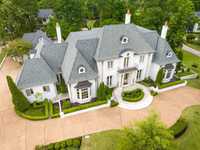 LUXURIOUS CUSTOM HOME BOASTING EXCEPTIONAL CRAFTSMANSHIP