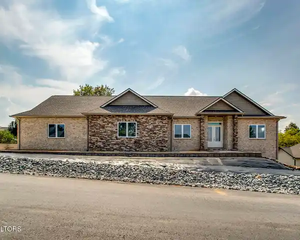 BEAUTIFULLY DESIGNED ALL-BRICK AND STONE NEW CONSTRUCTION