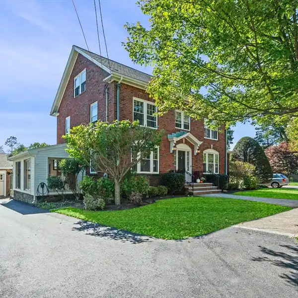 STATELY BRICK COLONIAL IN THE BEACH BLUFF AREA
