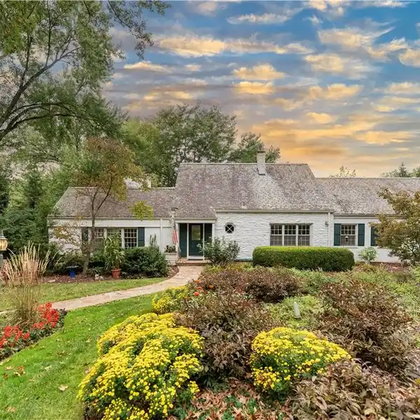 CLASSIC WHITE CAPE COD HOME