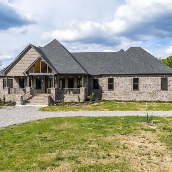 CUSTOM BRICK ESTATE ON 40 ACRES OF REFINED LIVING