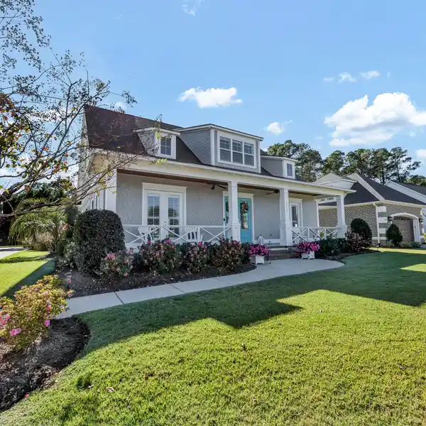 UPGRADED COASTAL HOME IN PREMIER WATERFRONT COMMUNITY