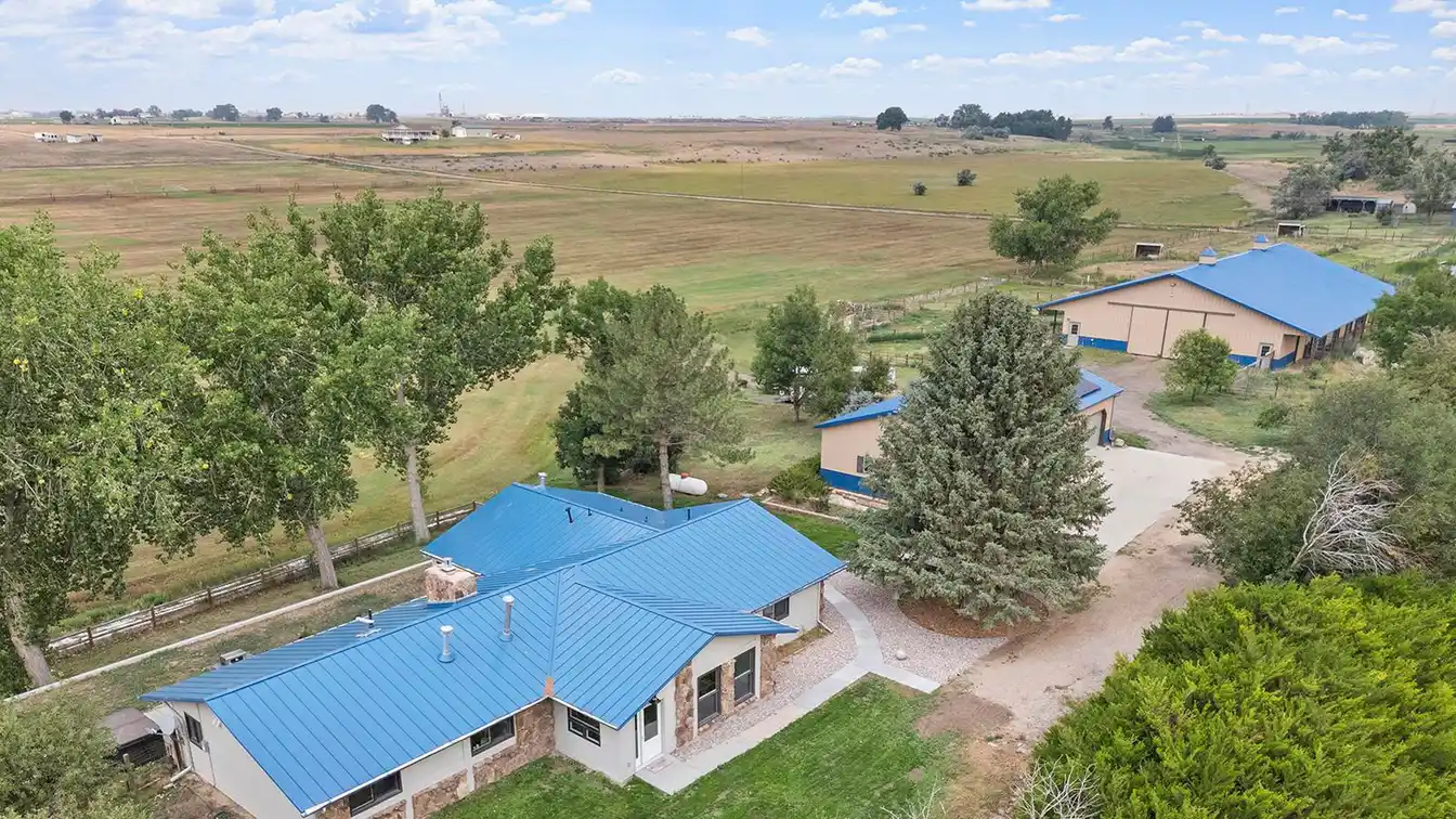Custom Ranch Home with Large Detached Garage and Barn on 40 Acres
