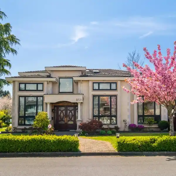 EUROPEAN-INSPIRED HOME ON AN EXPANSIVE CORNER LOT