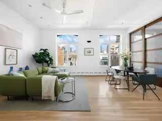 Dramatic and Creative Penthouse Filled with Abundant Natural Light