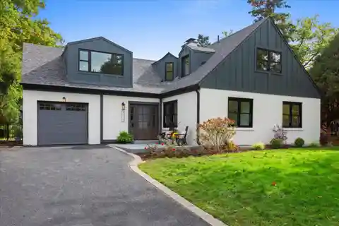 Golf Course Elegance with Sunroom and Designer Kitchen