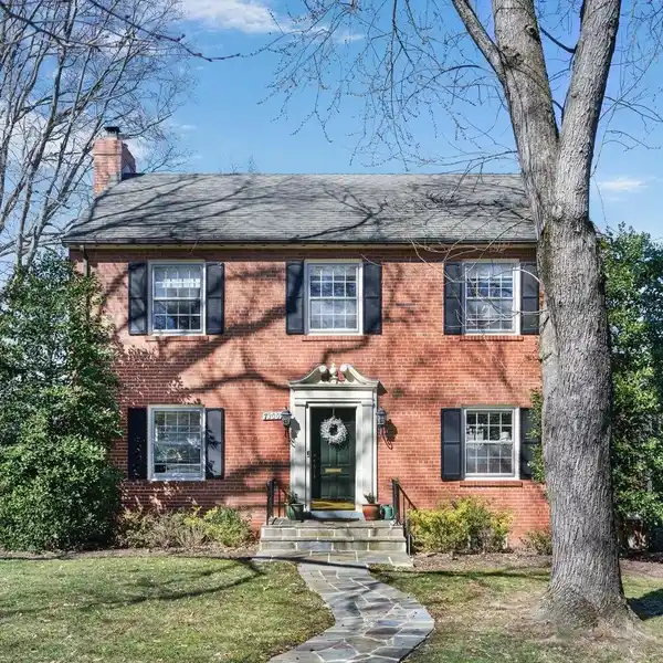 CHARMING BRICK COLONIAL ON A SPACIOUS CORNER LOT