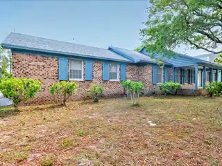 A Rare Intracoastal Offering — Iconic Oak Island Estate on Two Expansive Waterfront Lots
