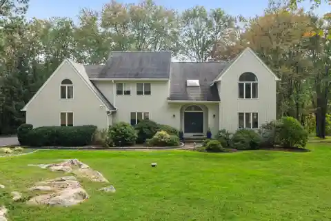 Exceptional Home on Six Lush Acres