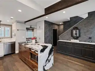 Extensively Renovated Townhome Blocks from the Sand