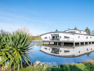 Striking Home Floating Above the Water