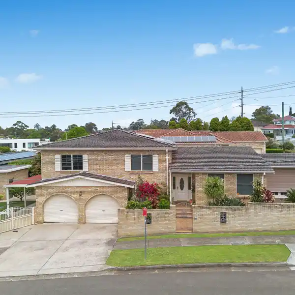 SPRAWLING TRI-LEVEL HOME OFFERED FOR THE FIRST TIME
