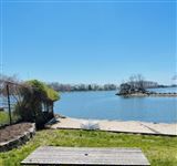 WATERFRONT PROPERTY WITH PRIVATE SANDY BEACH