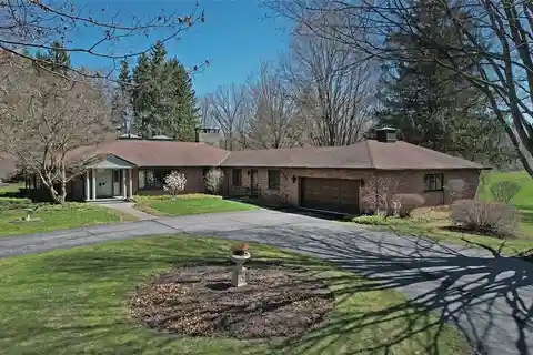 Stately Brick Ranch on over Seven Acres