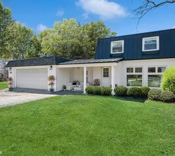 COMPLETELY REIMAGINED HOME WITH HIGH-END FINISHES