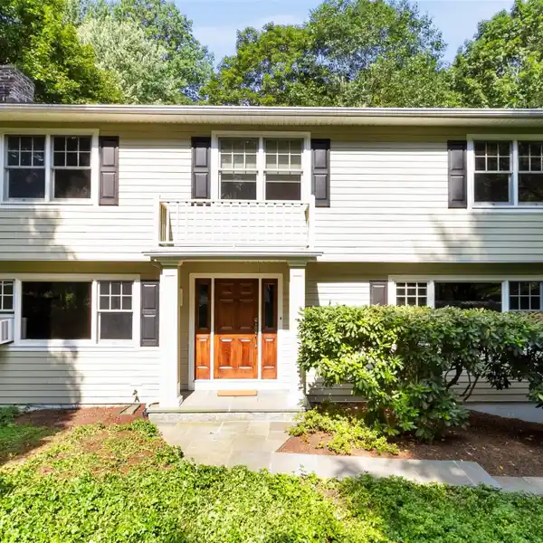 BEAUTIFULLY MAINTAINED FOUR-BEDROOM COLONIAL HOME